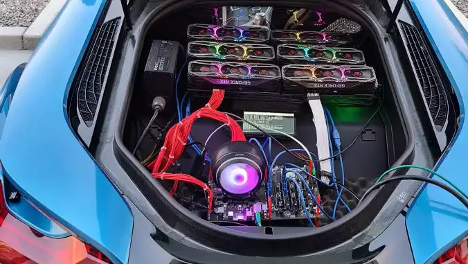 A man who built a mining rig in the back of his BMW "to annoy gamers".