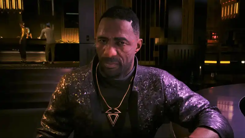 It turns out that you can find Idris Elba Cyberpunk2077 characters hanging out and working a regular job in the city at night before you start the expansion